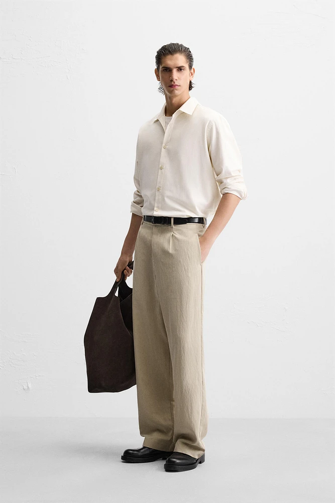 PANTALON COUPE LARGE À PLIS