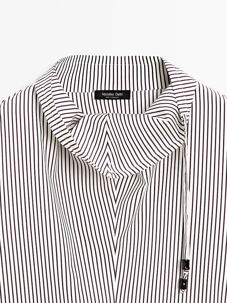 Blouse with neckline drawstring and appliqué