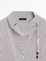 Blouse with neckline drawstring and appliqué