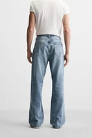 RIPPED FLARE FIT JEANS