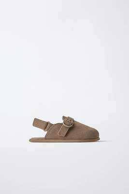 SABOTS EN CUIR