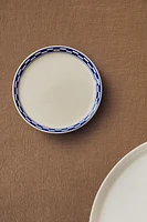 CERAMIC SIDE PLATE WITH CHECKED RIM