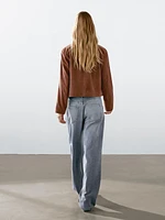 Veste courte boutons recouverts en cuir finition daim