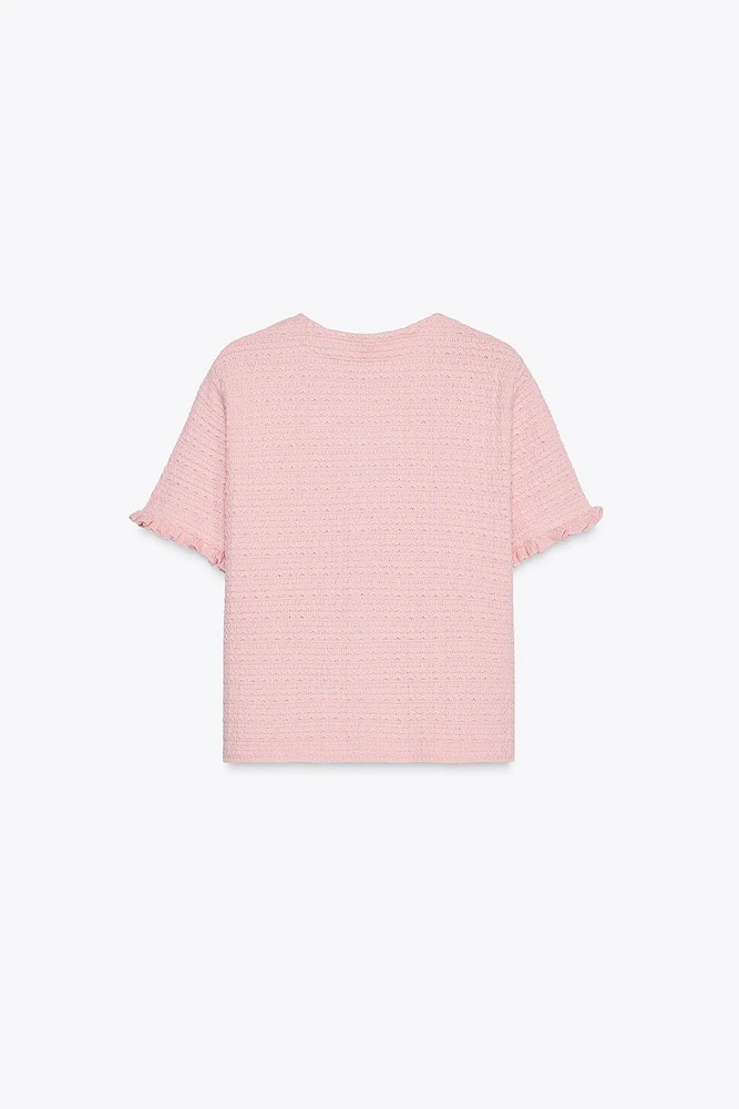 GILET EN MAILLE À VOLANTS