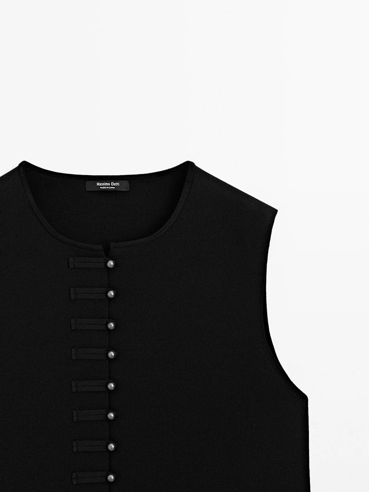 Veste sans manches en maille boutons fantaisie