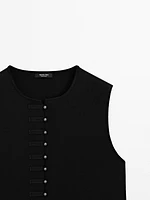 Veste sans manches en maille boutons fantaisie