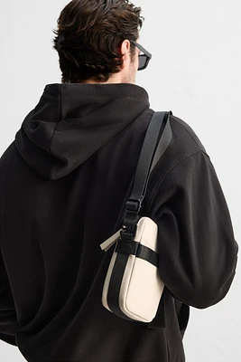 RUBBERIZED CROSSBODY BAG