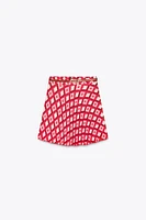 MINI JUPE À IMPRIMÉ GÉOMÉTRIQUE AVEC CEINTURE