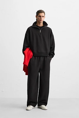 TECHNICAL QUARTER-ZIP SWEATSHIRT