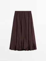 Pleated balloon midi skirt