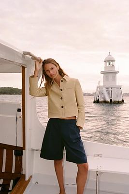 LONG PLEATED SHORTS