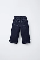 JUPE-CULOTTE EN JEAN À NŒUDS