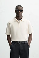 POLO À TEXTURE AVEC ZIP