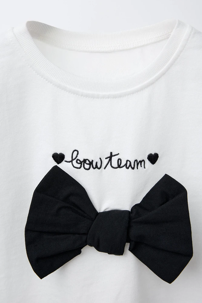 EMBROIDERED TEXT AND BOW T-SHIRT
