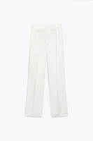 HIGH-WAISTED PLEATED SATIN PANTS