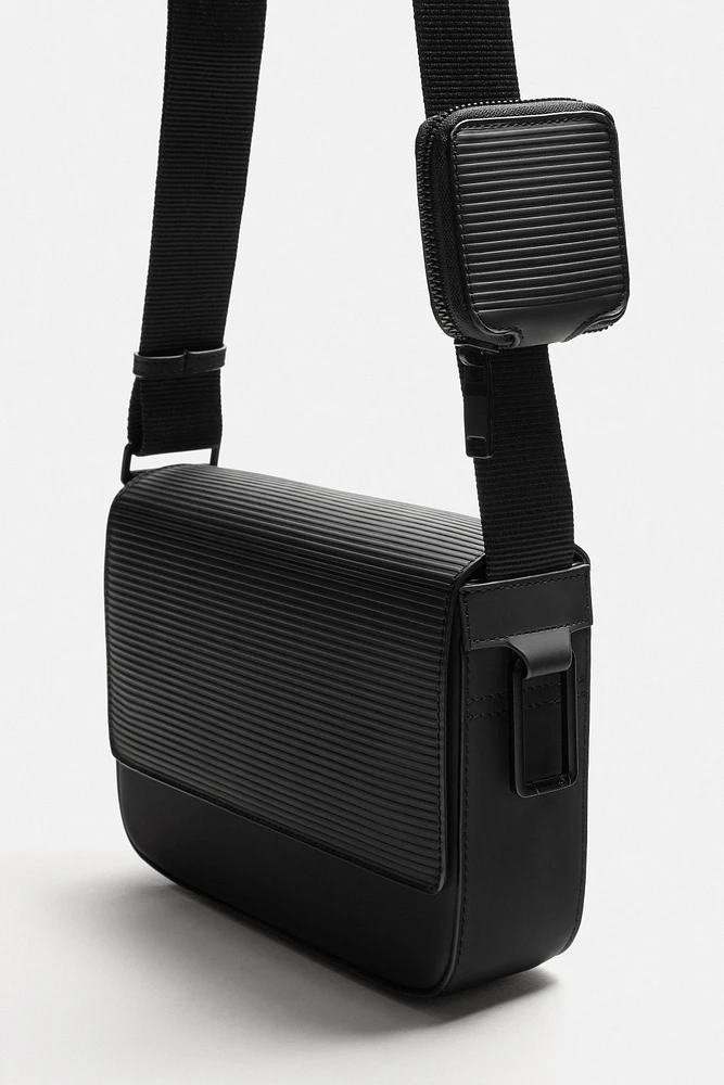 TEXTURED RUBBERIZED CROSSBODY BAG