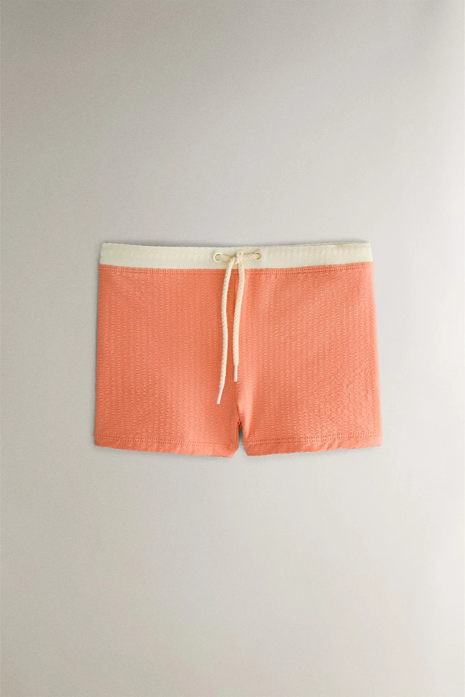 MAILLOT DE BAIN PLAGE ENFANT COULEUR CONTRASTANTE