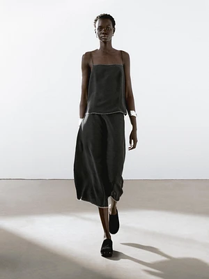Strappy top with contrast topstitching