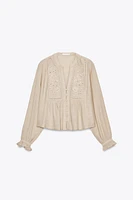 SHORT EMBROIDERED EYELET BLOUSE