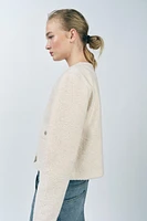 VESTE BOUCLÉ À BOUTONS