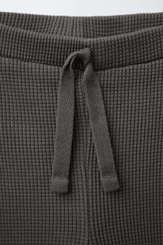 LEGGING WAFFLE À DENTELLE