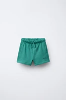 TEXT PLUSH SHORTS