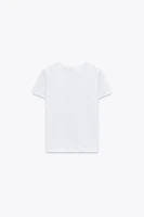 T-SHIRT EN MAILLE SURJET À MANCHES COURTES