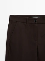 Pantalon slim flare taille basse