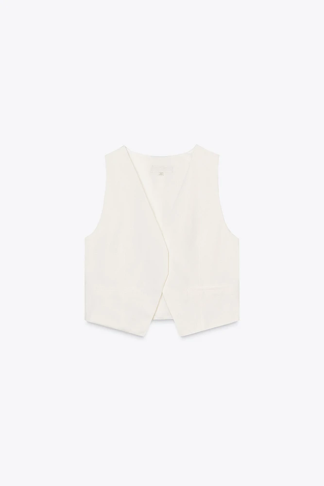 GILET À POCHES LISERÉ