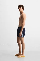 CONTRAST BANDS MID-LENGTH SWIMSUIT