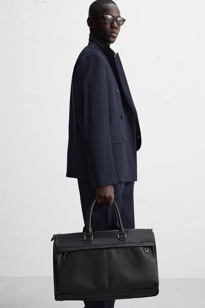 TEXTURED TRAVEL BAG