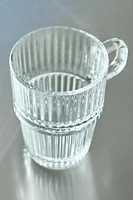 GLASS MUG WITH A RAISED DESIGN