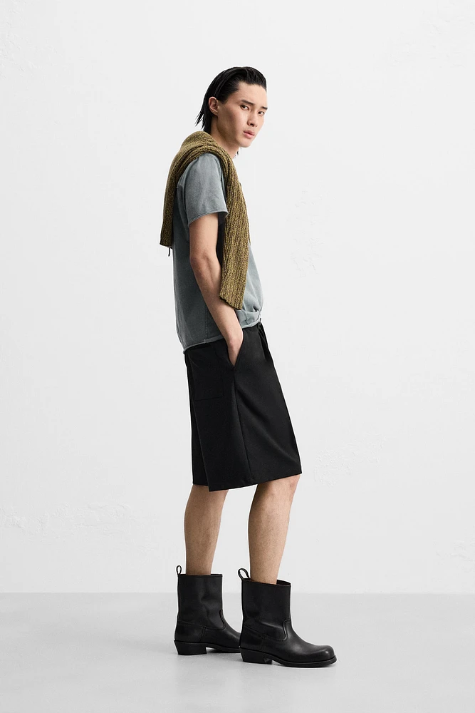 TEXTURED PLEATED SHORTS