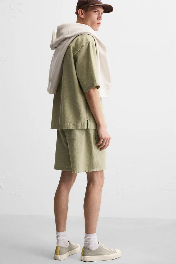 TEXTURED EMBROIDERED SHORTS