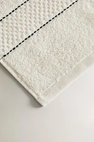 SERVIETTE DE BAIN BORDURE SURPIQÛRES