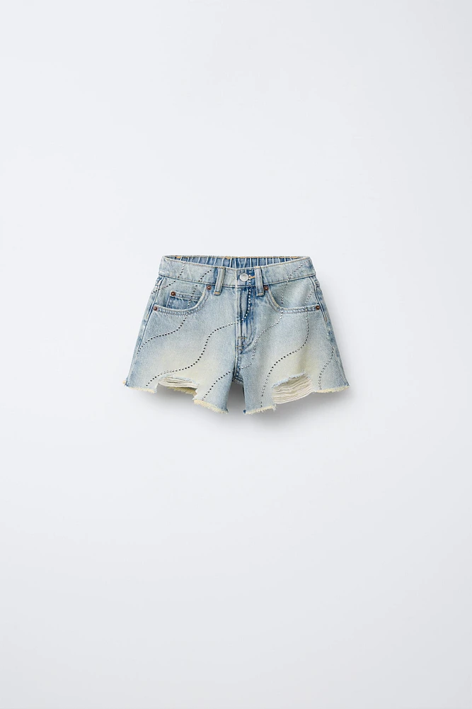 SHORT EN DENIM DÉCHIRÉ ET BRILLANT