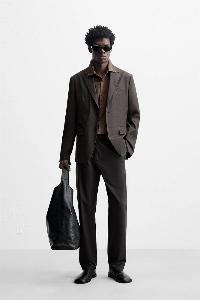 WAXED EFFECT SUIT PANTS