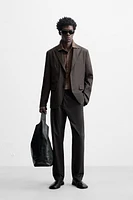 WAXED EFFECT SUIT PANTS