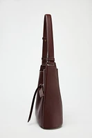 KNOTTED TOPSTITCHED BUCKET BAG