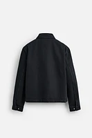 VESTE EN JEAN À ZIP