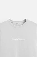 T-SHIRT À MESSAGE IMPRIMÉ