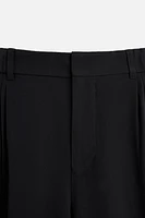 FLOWY PLEATED PANTS