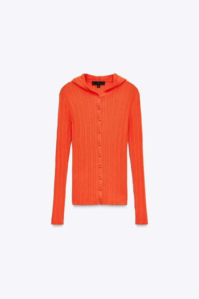GILET EN MAILLE À CAPUCHE ET BORD CÔTELÉ