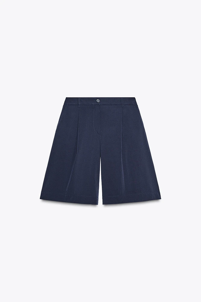 LONG PLEATED SHORTS