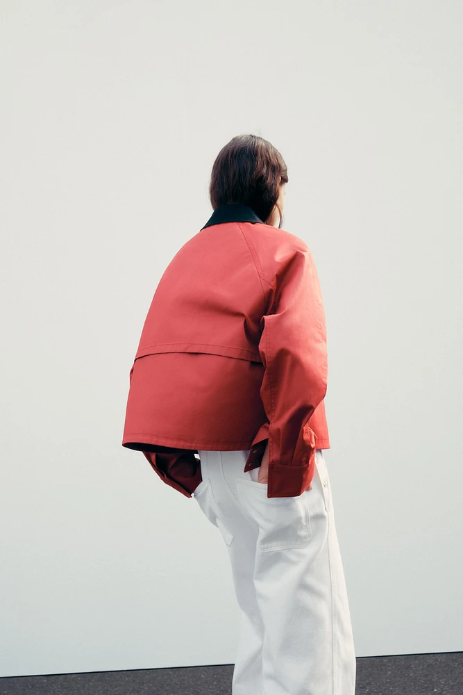 VESTE CIRÉE À COL EN MATIÈRES VARIÉES