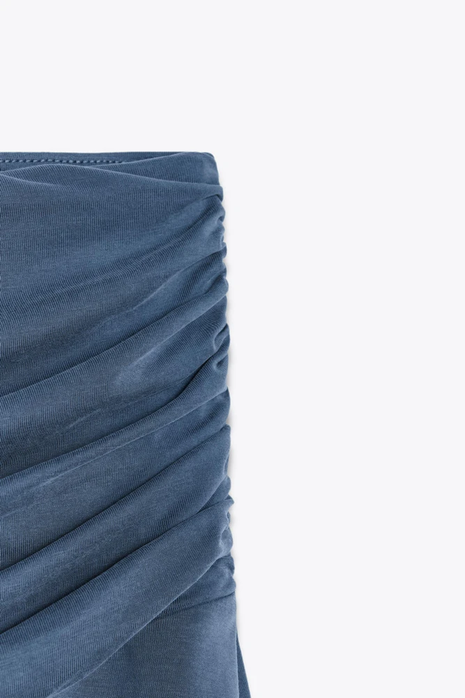 ASYMMETRIC MINI SKIRT