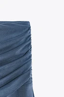 ASYMMETRIC MINI SKIRT