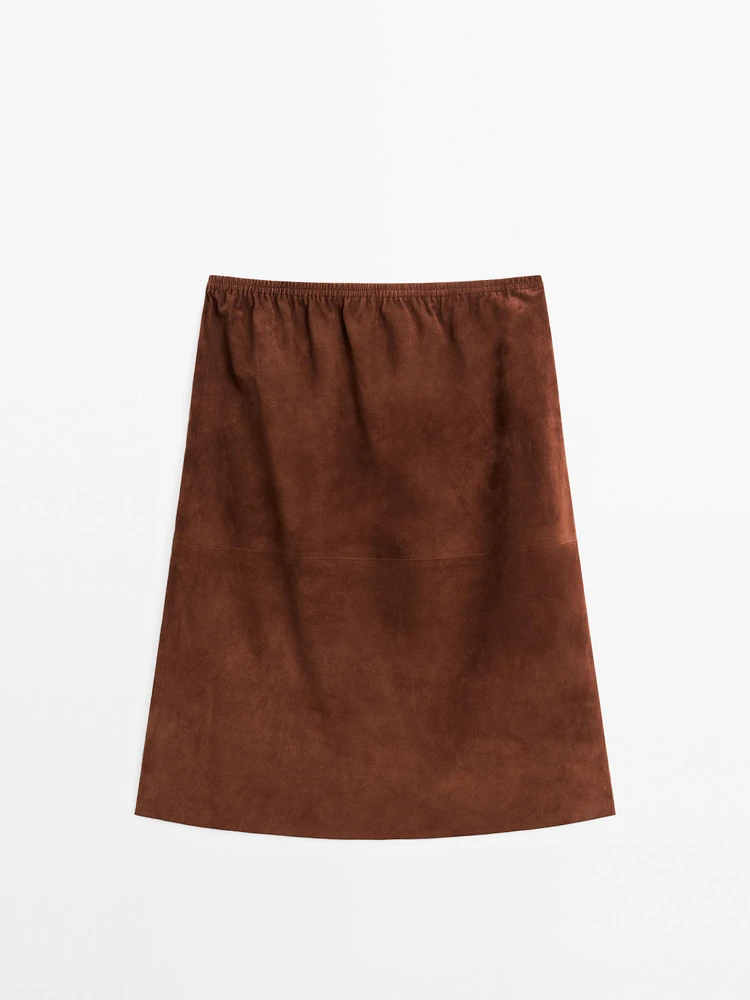 Jupe droite en cuir finition daim