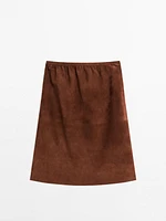 Jupe droite en cuir finition daim