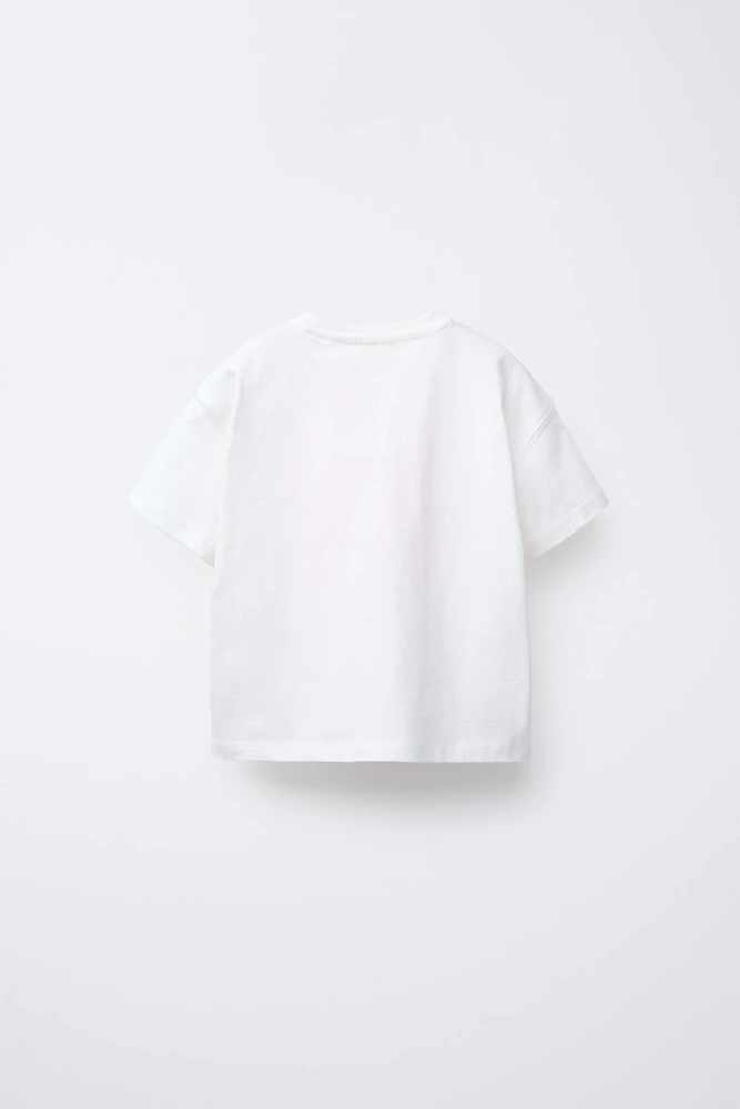T-SHIRT À INSCRIPTION ET DÉCOR FLEURS